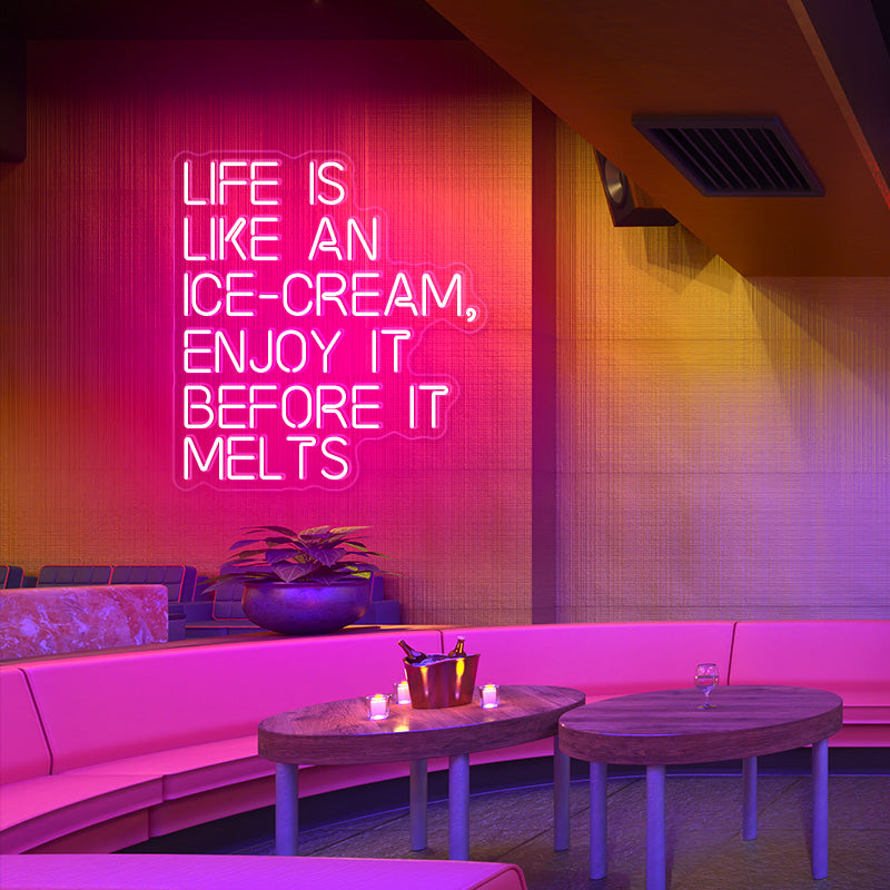 LIFE IS LIKE AN ICE-CREAM, ENJOY IT BEFORE IT MELTS neon sign in the colour deep pink. Neon sign produced by Neon Partys.