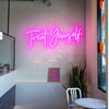 Treat Yourself neon sign