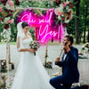 "She Said Yes" outdoor neon signs