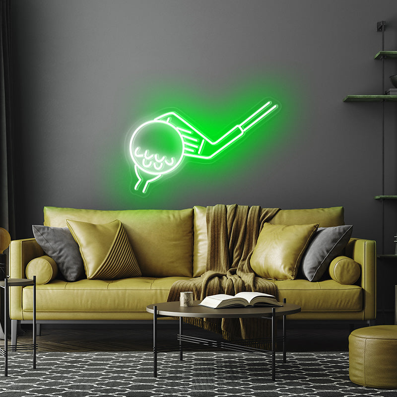 Golf Led Neon Lights in the colour green. Neon light is hanging above couch in men's living room. 