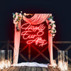 Happily Ever After X neon sign in red. Hanging on arch for proposal. Neon sign produced by Neon Partys. 