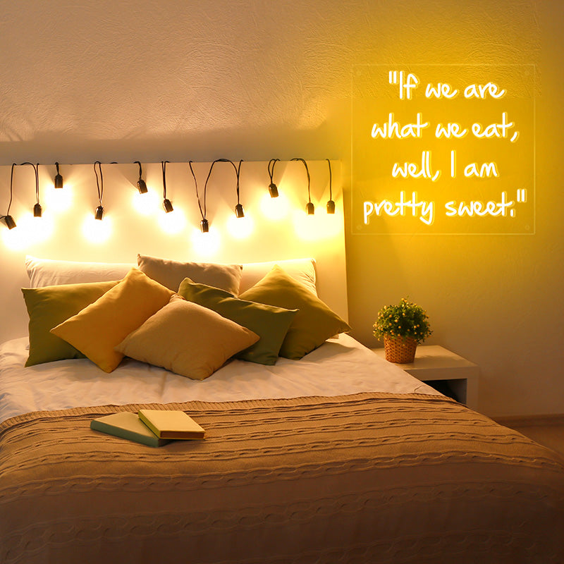 If we are what we eat, well, I am pretty sweet neon sign in golen yellow. Produced by Neon Partys. 