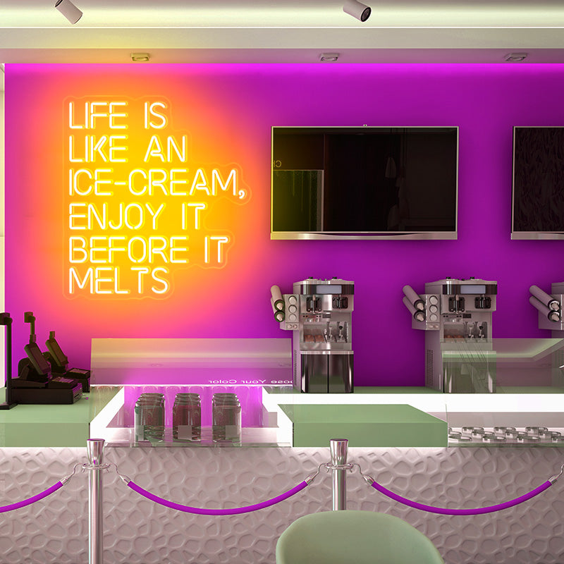 LIFE IS LIKE AN ICE-CREAM, ENJOY IT BEFORE IT MELTS neon sign in the colour golden yellow. Neon sign produced by Neon Partys. 