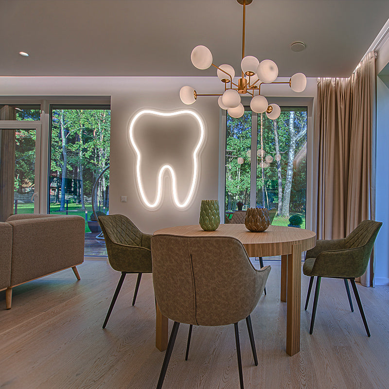 Large Tooth neon sign installed in living room. Quirky and unique wall art. Light produced by  Light produced by Neon Partys. 