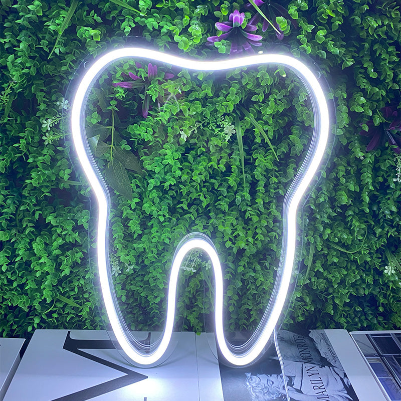 Outline of molar tooth neon light.  Light produced by Neon Partys. 