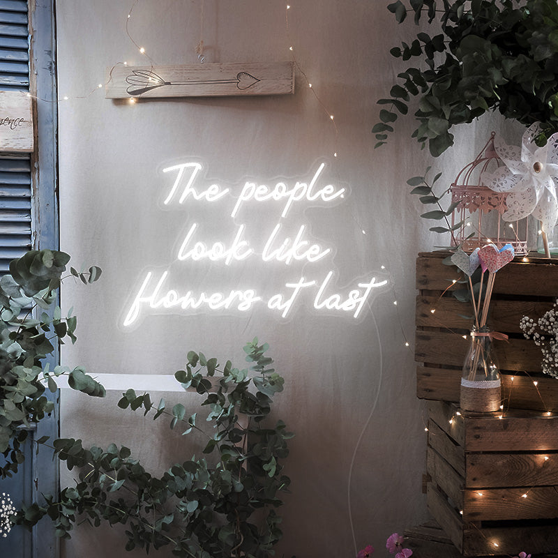 The people look like flowers at last LED neon quote light