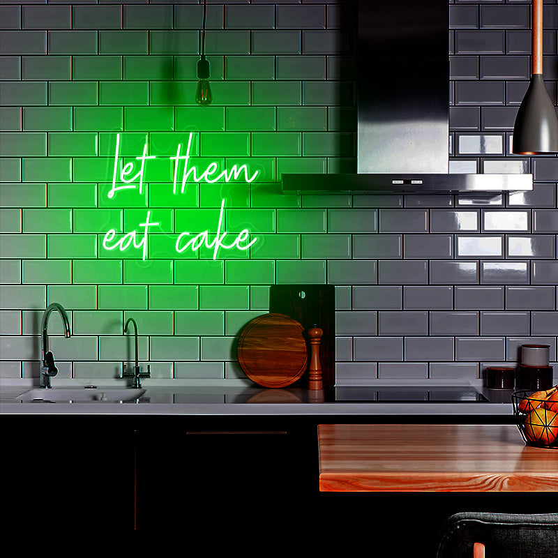 let them eat cake in the color green. Famous food quote neon sign hanged in kitchen as beautiful kitchen wall art. Neon sign produced by Neon Partys. 