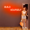 "Build Yourself" neon wall art