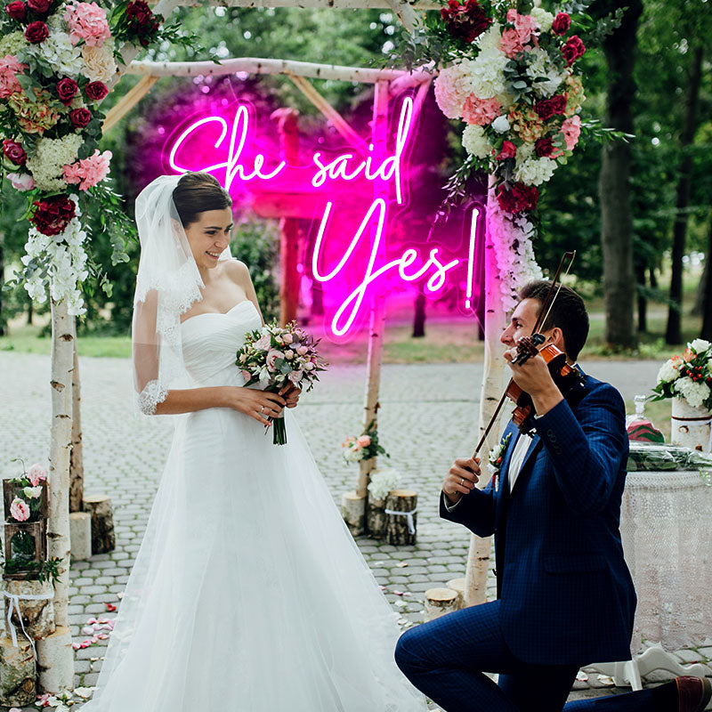 "She Said Yes" outdoor neon signs